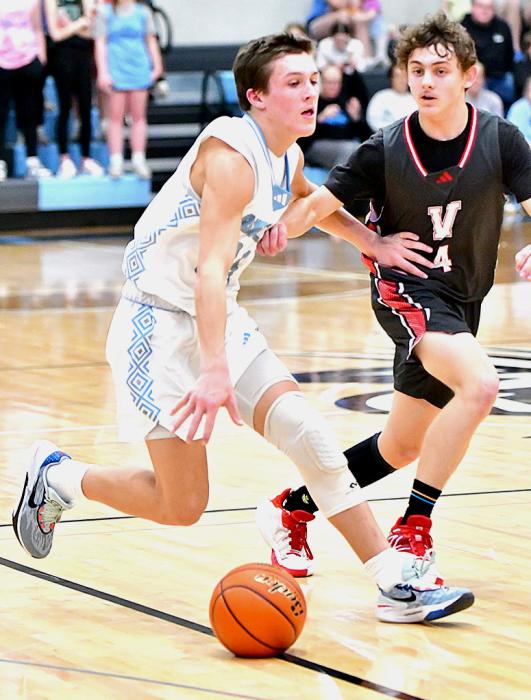 Dominic Beebout #4 stays on task guarding his man during subdistricts against Summerland - Clearwater/Ewing/Orchard Tuesday, February 20, 2024. Photo by Amy Kerkman | Summerland Advocate-Messenger